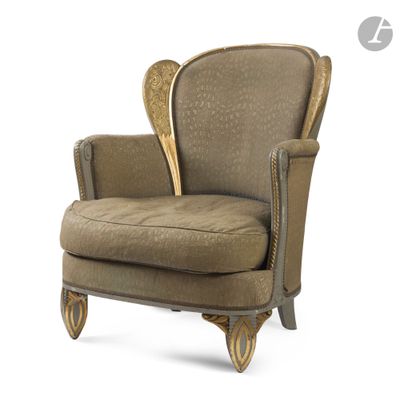 an upholstered chair with gold trim and a brown upholstered seat