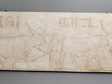 une plaque en marbre blanc représentant un homme à cheval
