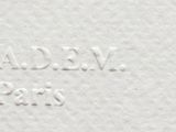 an image of a close up of a white plate with writing on it