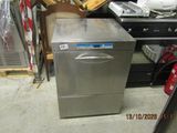 an image of a dishwasher sitting in a warehouse