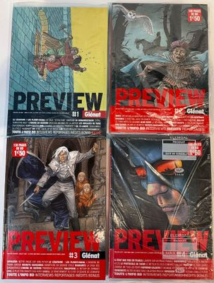 the covers of the comic books are lined up on a table