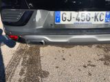 a car that has a license plate on the back of it