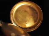 a close up view of a gold plated instrument