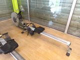 a machine that is sitting on the floor next to a window
