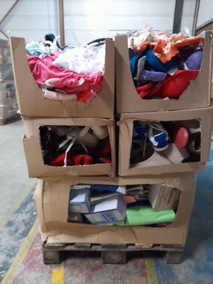 a cart with boxes full of items on top of it