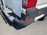 a white truck with a black bumper and a white truck with a black bumper and a white truck with a black bumper and a white truck with a black