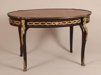 Table basse en acajou et placage d'acajou, à plateau chantou…