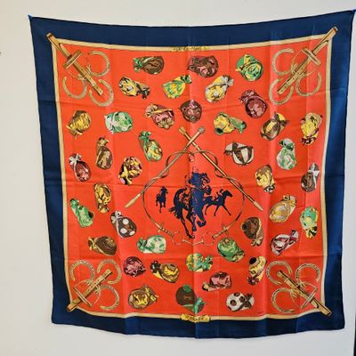 foulard en soie orange et bleu représentant un cow-boy à cheval