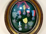 a picture of a picture of a medal display in a round frame