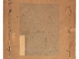 an old picture of a box with a piece of paper on it