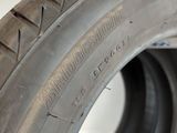 an image of a close up of a tire on a white surface