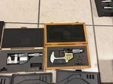 a lot of tools that are sitting on the floor