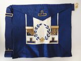 a blue and white masonic apron with a cross and laurel on it