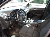 a picture of a car interior with a steering wheel and dashboard