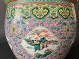a vase that has a picture of a woman on it