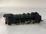 a toy train that is sitting on a white surface