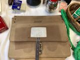 a purse that is sitting on a table next to other items