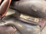 a close up of a horse ' s saddle with a bit of leather