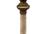 a wooden pedestal with a marble top and a metal base
