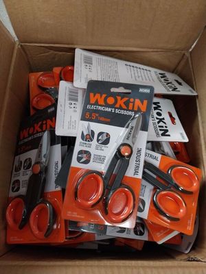a box full of scissors that are sitting in it