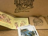 a box with a picture of a blue car inside of it