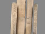 four rolls of paper are stacked on top of each other