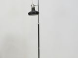 an image of a lamp that is on a stand in a room