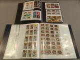 a lot of stamps in a book on a table