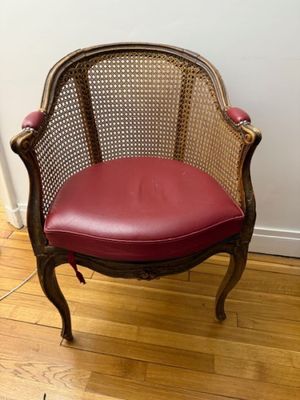 a chair that is sitting on a hard wood floor