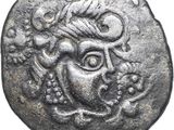 une pièce d'argent portant l'image d'un homme