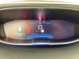 the dashboard of a car with a digital display in the center