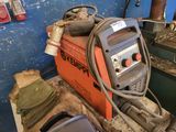 a welding machine that is sitting on a table