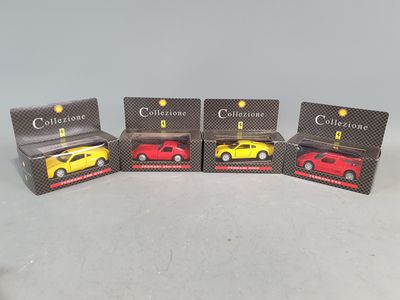 a set of four toy cars sitting on top of each other