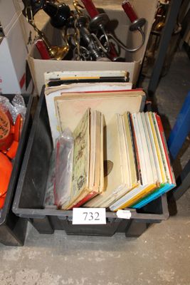 two bins filled with books and other items
