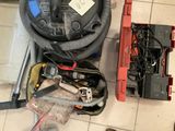 a picture of a tool box with tools on the floor