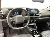 the interior of a car with a steering wheel, dashboard, and dash board