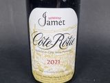 a bottle of wine that is sitting on a table