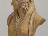 bust of a woman with a crown on her head