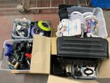 a box full of assorted items sitting on the floor