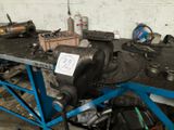 a machine that is sitting on a table in a garage