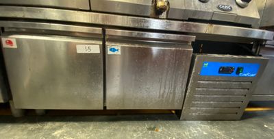 several stainless steel ovens are stacked on top of each other in a kitchen