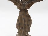 statue of an angel with a crown on its head