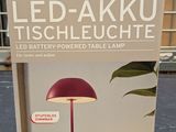 a box with a lamp on it sitting on a table