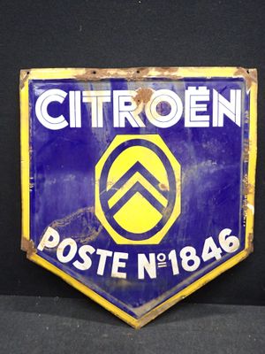 un panneau bleu et jaune sur lequel est inscrit le mot « Citroën »