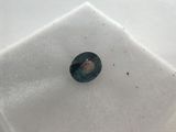 a picture of a piece of glass on a white cloth