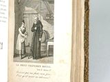 an open book with a picture of a man and a woman standing next to each other