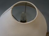 two lamps that are sitting on a table