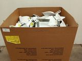 a cardboard box with a bunch of items inside of it