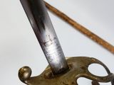a close up view of a sword with a handle