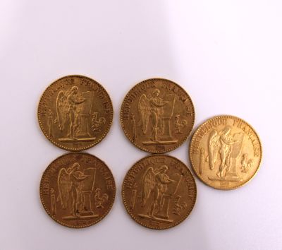 four gold coins with the image of a man and woman on them